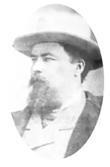 Samuel Stotzer, credit Museum at the Portage. White male mid 40s with long beard and mustache and large fedora style hat.