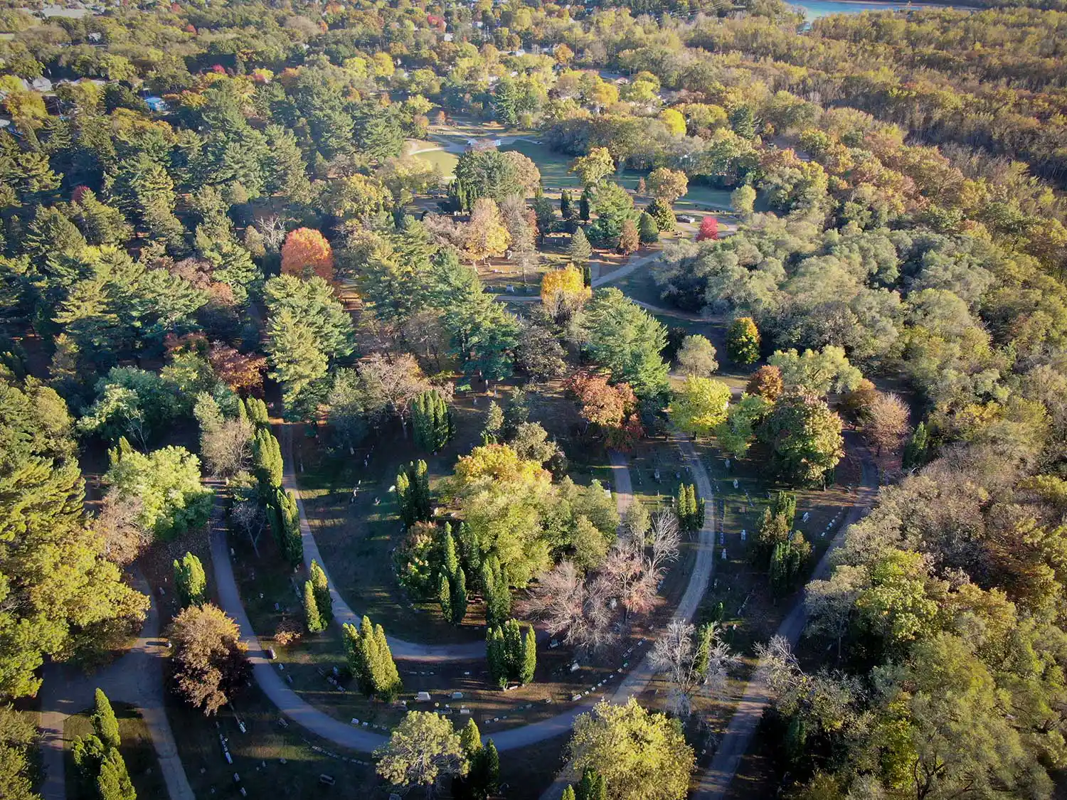 Aerial view of Silver Lake Cemetery area in a wooded area.